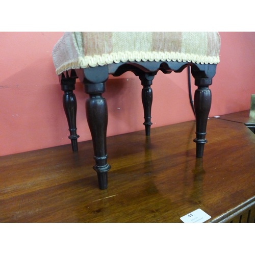 9 - A Victorian mahogany footstool