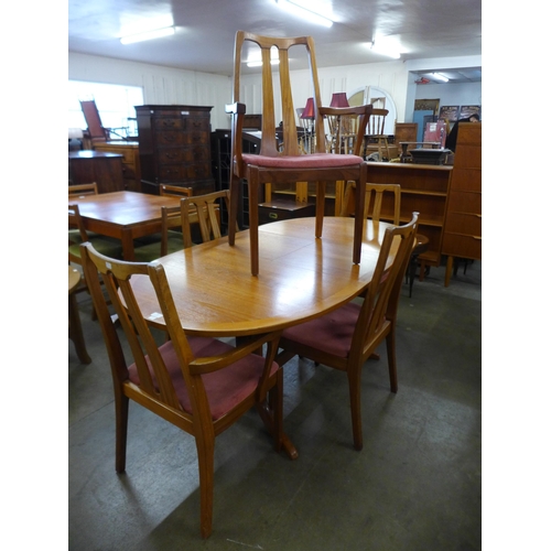 90 - A teak extending dining table and a set of five Nathan teak dining chairs