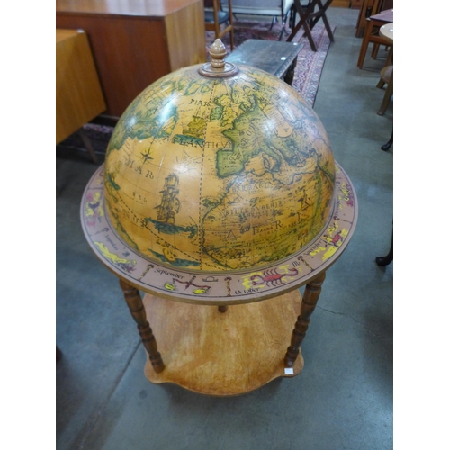 96 - A terrestrial globe cocktail cabinet/trolley