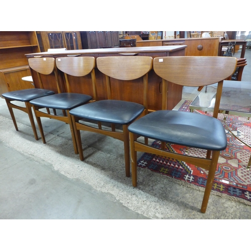 98 - A set of four teak dining chairs