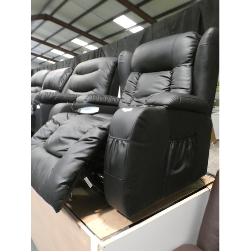 3136 - Black upholstered electric reclining heated/massaging armchair * this lot is subject to VAT