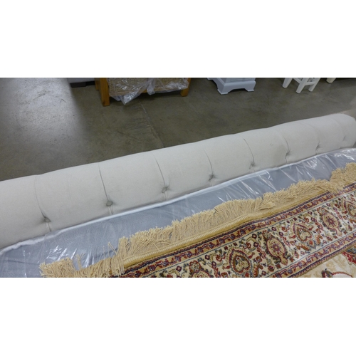 1397 - An oatmeal buttoned kingsize bed frame