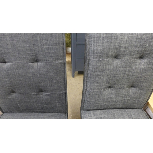 1490 - Two black upholstered button back dining chairs