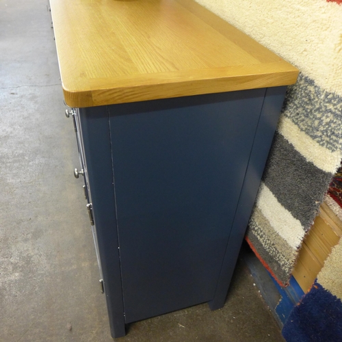 1500 - A Rutland blue painted oak three drawer three door sideboard * this lot is subject to VAT