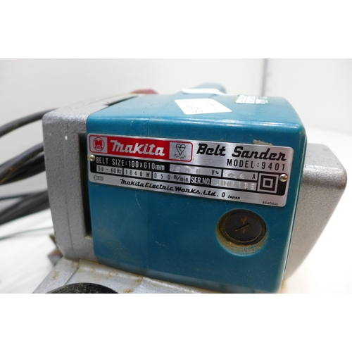 2012 - Heavy duty Makita belt sander, model 9401, 100 x 610mm, with qty. of sanding belts to fit - W