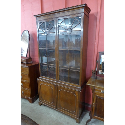 16 - A George III style mahogany bookcase