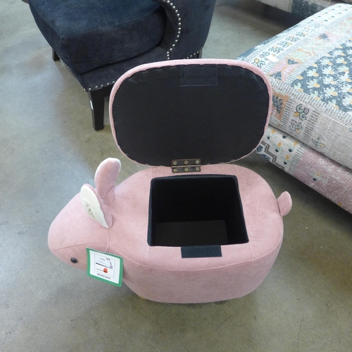 1369 - A pink fabric rabbit footstool with storage