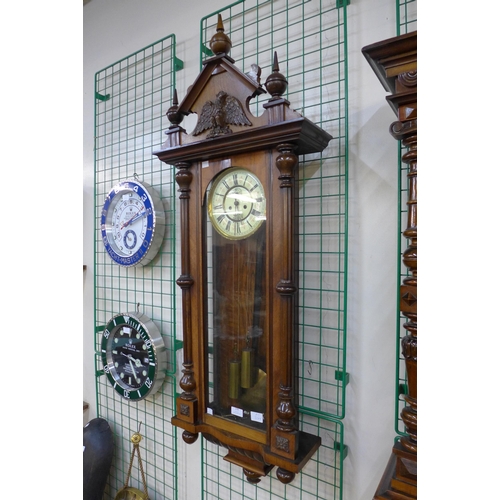 361 - A 19th Century walnut Vienna double weight wall clock