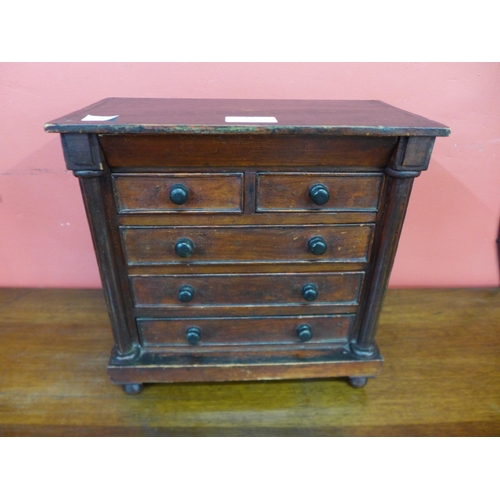 390 - A Victorian stained pine apprentice's/miniature chest of drawers