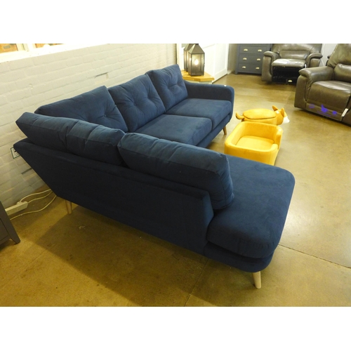 1435 - A blue velvet upholstered corner sofa