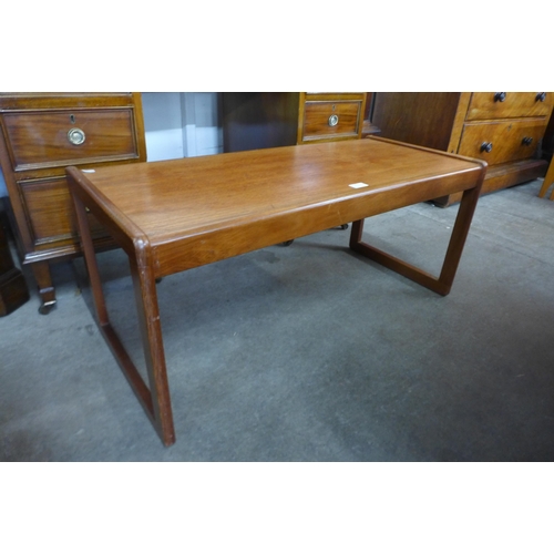 100 - A teak rectangular coffee table