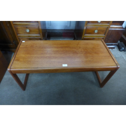 100 - A teak rectangular coffee table