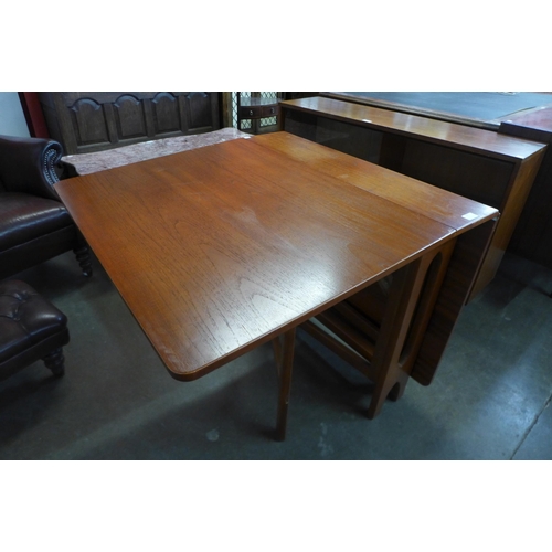 105 - A teak drop-leaf table