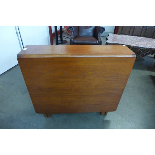 105 - A teak drop-leaf table