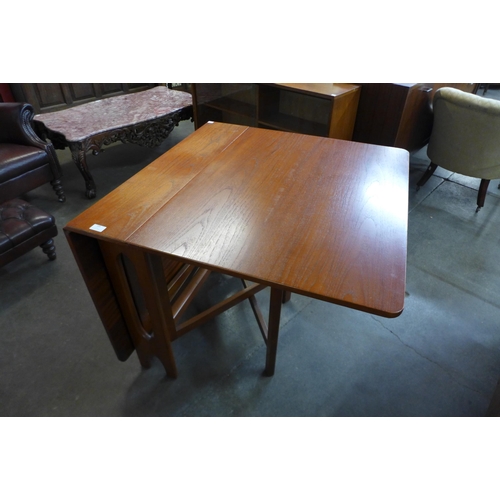 105 - A teak drop-leaf table