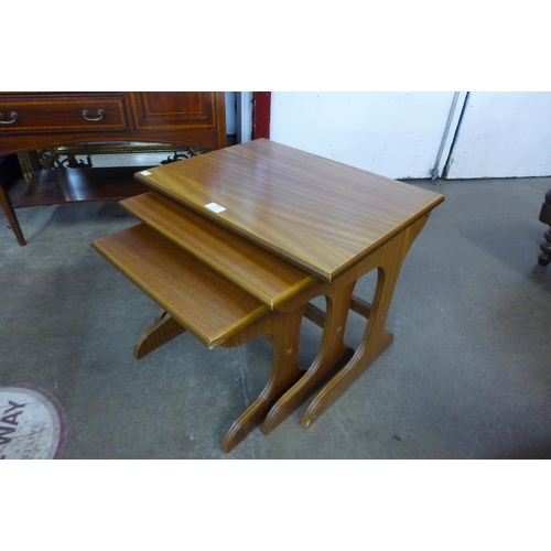 106 - A teak nest of tables