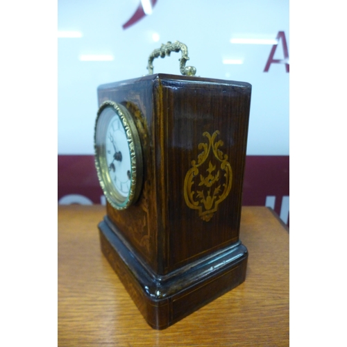 12 - A 19th Century French inlaid rosewood mantel clock, movement signed Louis et Miera, Paris