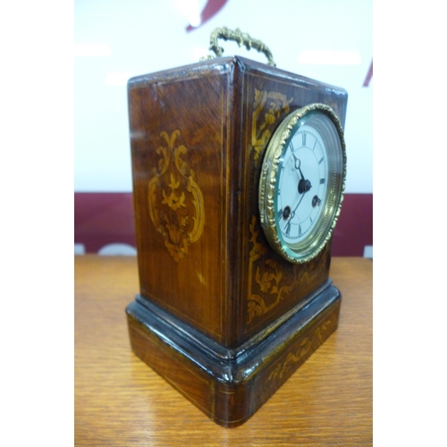 12 - A 19th Century French inlaid rosewood mantel clock, movement signed Louis et Miera, Paris