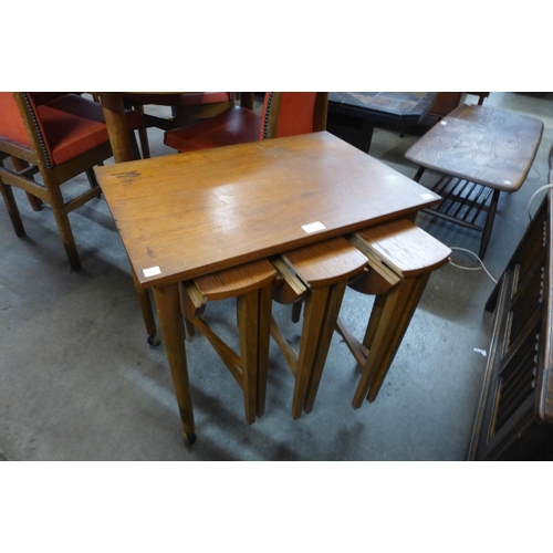 120 - A teak nest of tables