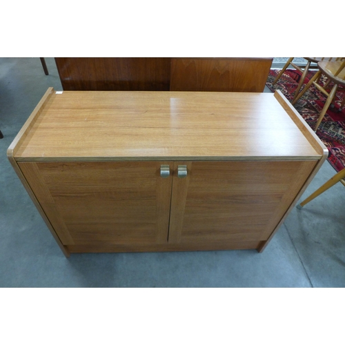 126a - A teak two door cabinet