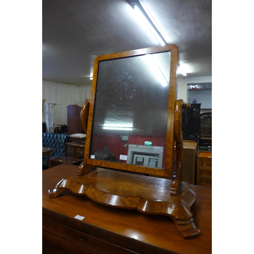 129 - A Victorian birds eye maple toilet mirror