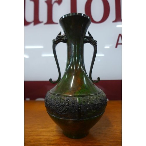 13 - A Chinese verdigris coloured bronze two handled vase