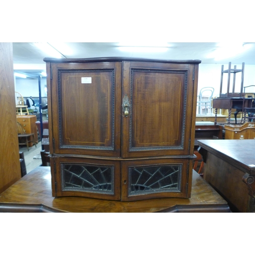 134 - An Edward VII inlaid mahogany table top cabinet