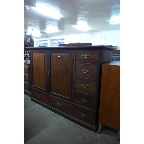 139 - A George III mahogany two door press cupboard