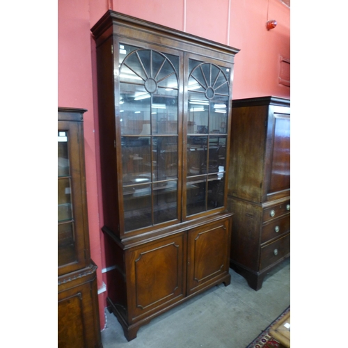 16 - A George III style mahogany bookcase