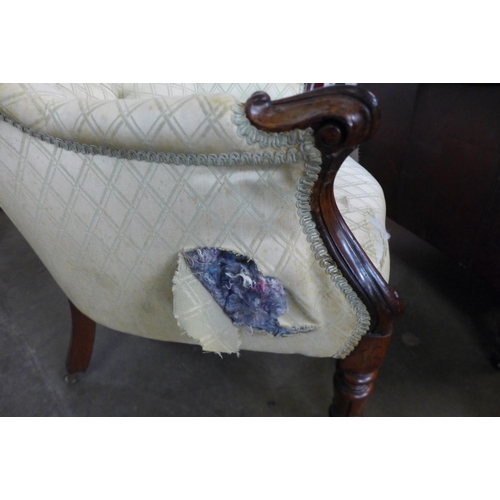 24 - A William IV rosewood and fabric upholstered armchair