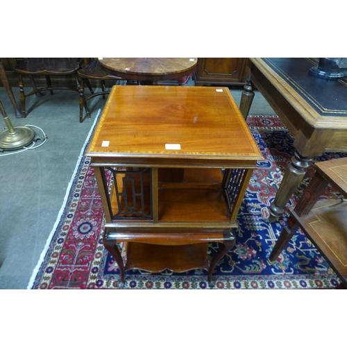 34 - An Edward VII mahogany and satinwood inlaid revolving bookcase