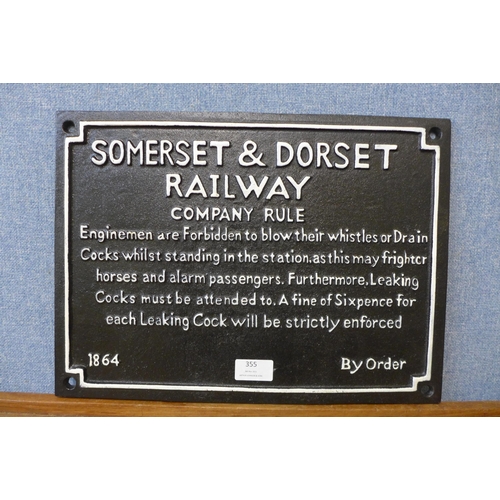 355 - A reproduction cast iron Somerset & Dorset Railway sign