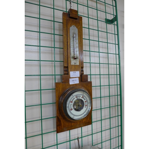 358 - An Art Deco oak aneroid barometer