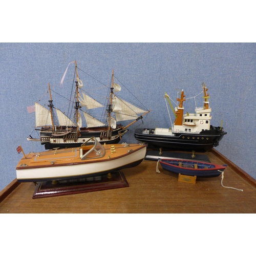 368 - A limited edition scale model of H.M.S. Beagle, a model of a sailing tug and two other boats