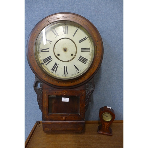 369 - A 19th Century American inlaid walnut wall clock and a small Edward VII mahogany mantel timepiece, a... 