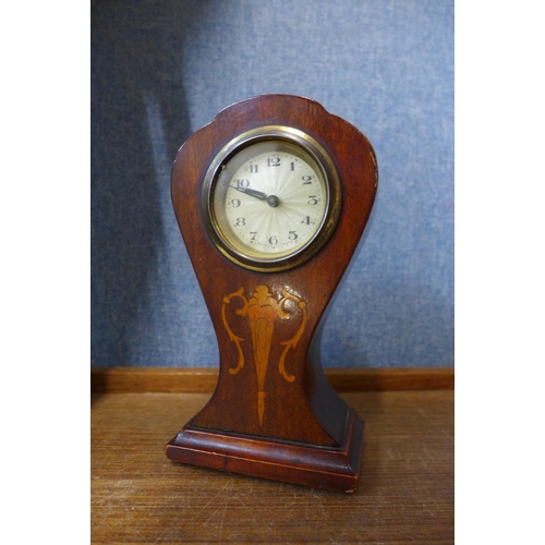 369 - A 19th Century American inlaid walnut wall clock and a small Edward VII mahogany mantel timepiece, a... 