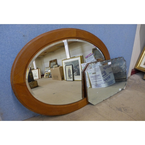 370 - An Edward VII walnut oval mirror and another