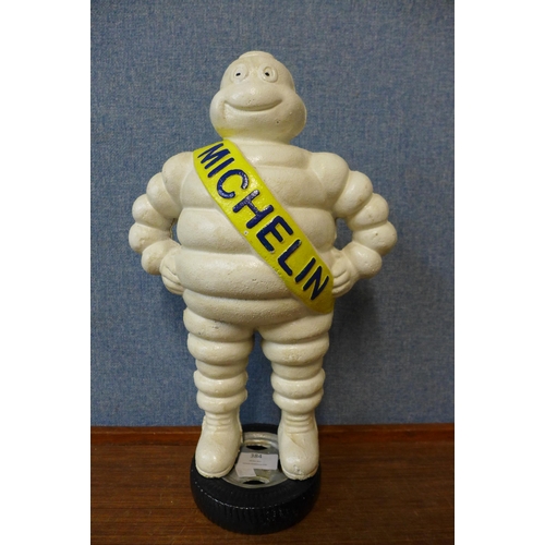 384 - A cast iron Michelin Man advertising figure