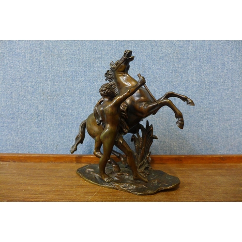 387 - A small French bronze Marley horse