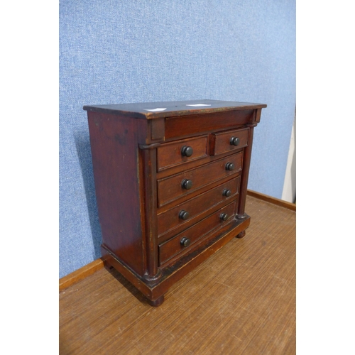 390 - A Victorian stained pine apprentice's/miniature chest of drawers