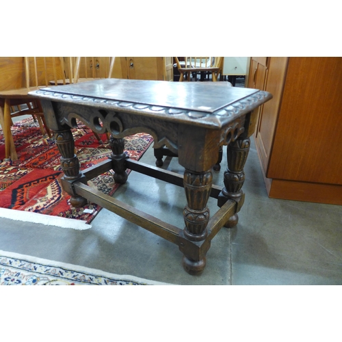 43 - A 17th Century style carved joint oak stool