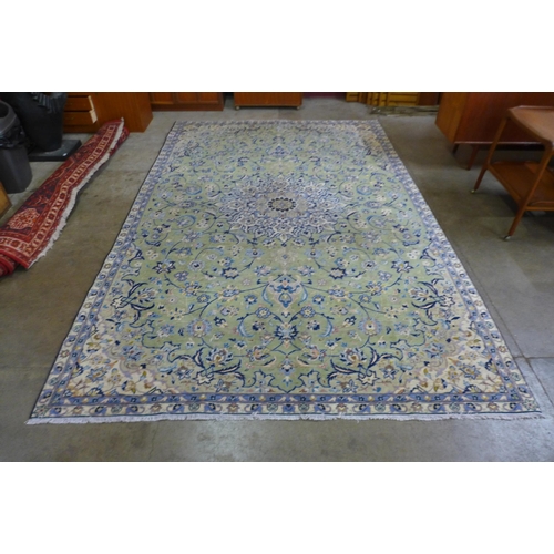 45 - A Persian hand knotted wool mint green ground Isfahan rug