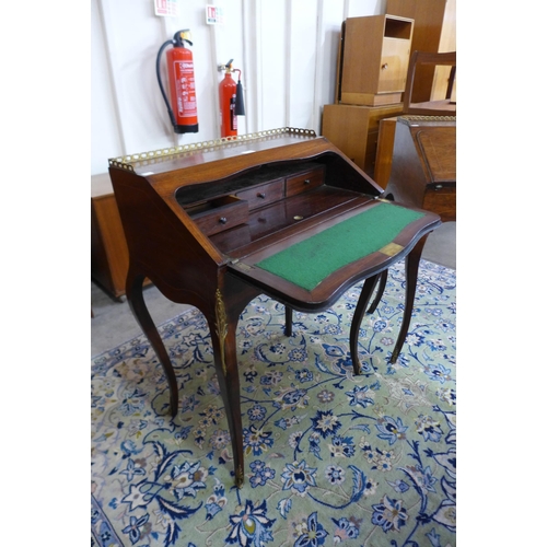 5 - A 19th Century French marquetry inlaid rosewood and gilt metal mounted bureau de dame