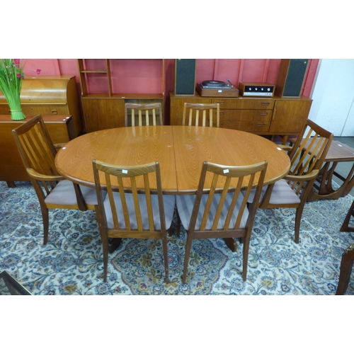 55 - A G-Plan Fresco teak extending dining table and six chairs