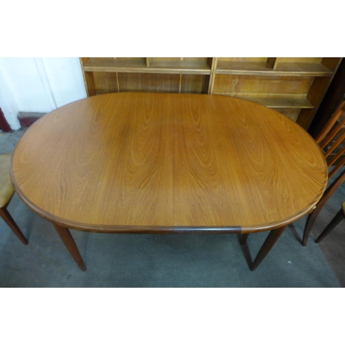 57b - A G-Plan Fresco teak extending dining table and four chairs