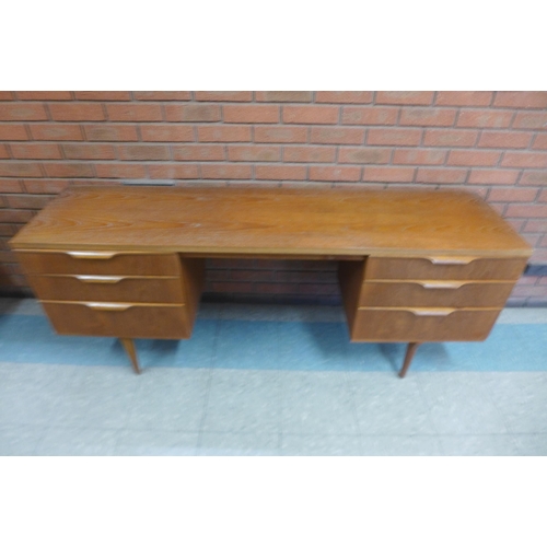 57c - An Austin Suite teak desk