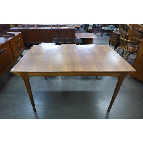 81 - A McIntosh teak extending dining table