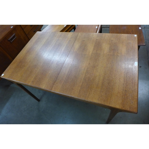 81 - A McIntosh teak extending dining table