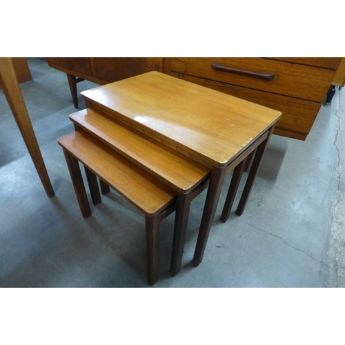 85 - A teak nest of tables