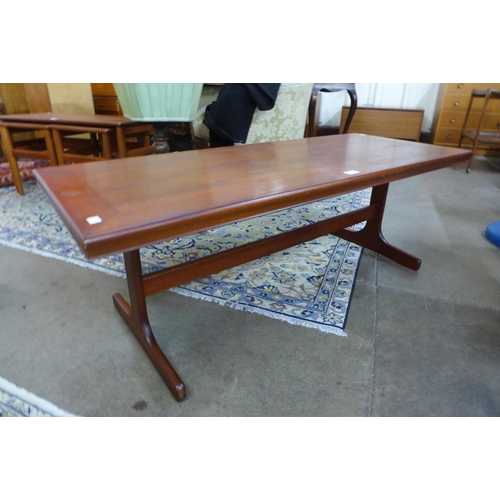 86 - A teak rectangular coffee table